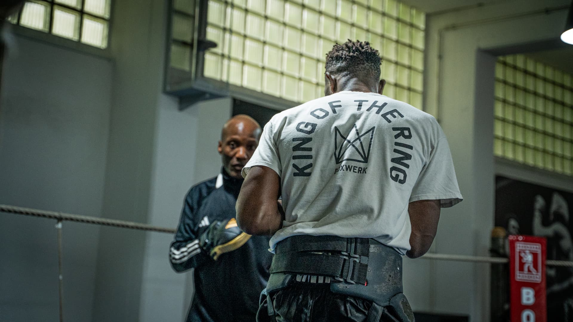 Coach Walu working with pro boxer John Serunjogi in the ring at Boxwerk Munich
