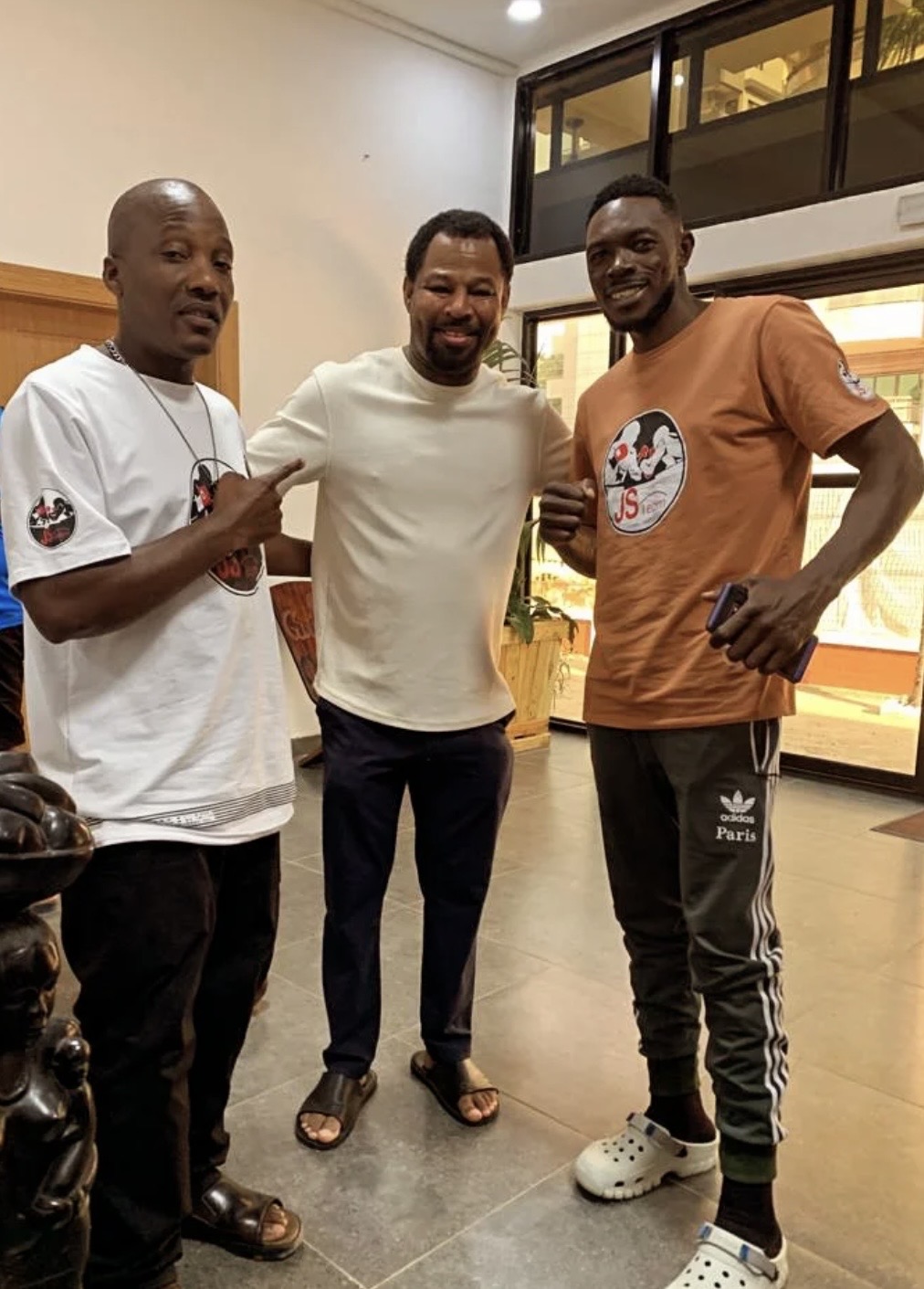 Coach Walu with Shane Mosley and pro boxer John Serunjogi